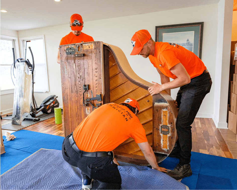 Professional piano moving by Extra Mile Moving